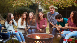 family around fire pit